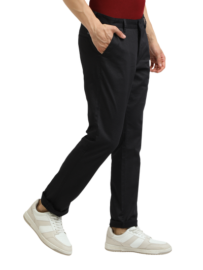 Model wearing Clarke Gable's Black Custom Fit Trousers in a casual setting