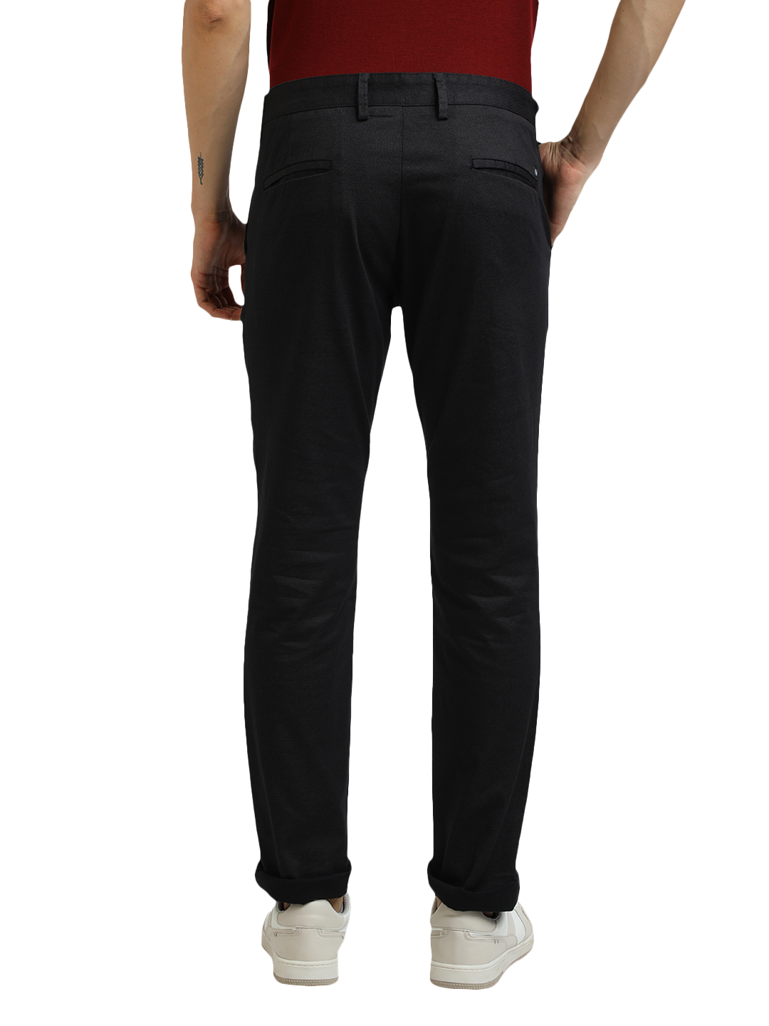 Model wearing Clarke Gable's Black Custom Fit Trousers in a casual setting