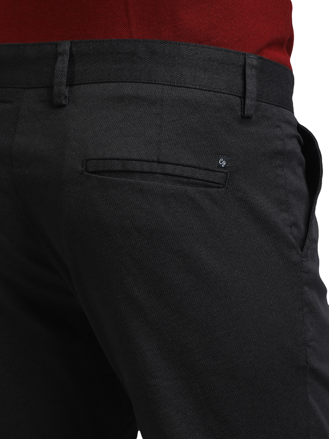 Model wearing Clarke Gable's Black Custom Fit Trousers in a casual setting