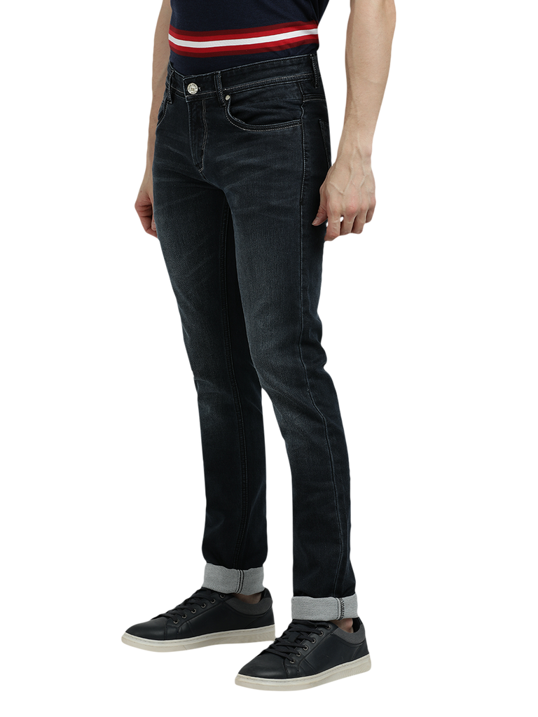 Model wearing Clarke Gable's Black Faded Skinny Fit Jeans in a casual setting