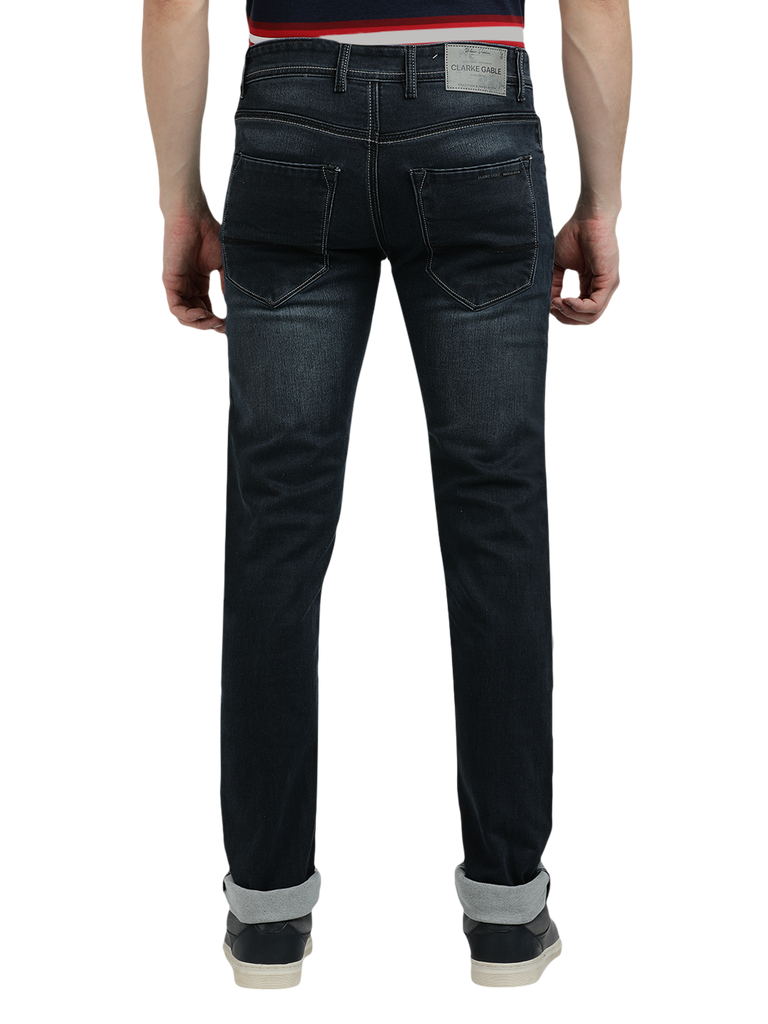 Model wearing Clarke Gable's Black Faded Skinny Fit Jeans in a casual setting