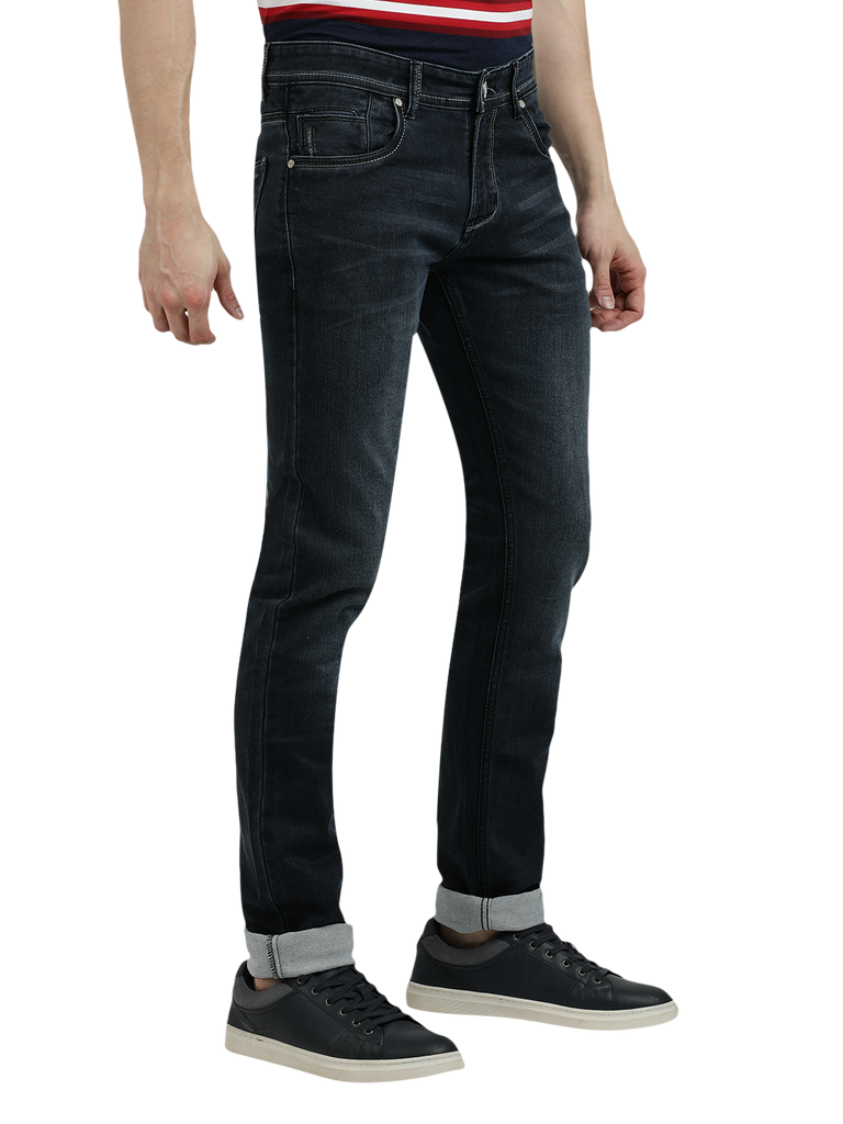 Model wearing Clarke Gable's Black Faded Skinny Fit Jeans in a casual setting