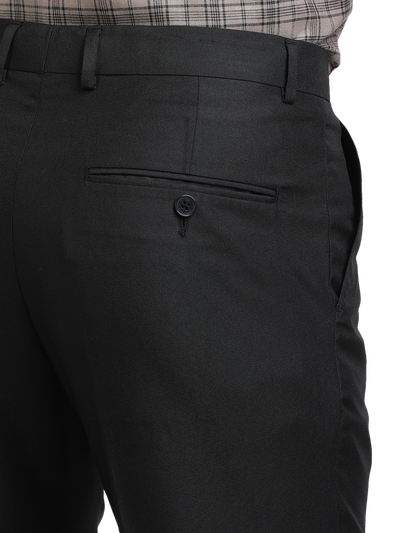 Model wearing Clarke Gable's Black Sharp Fit Trousers in a casual setting