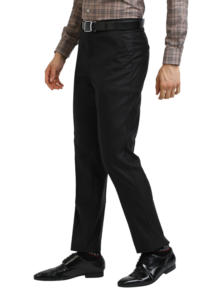 Model wearing Clarke Gable's Black Sharp Fit Trousers in a casual setting