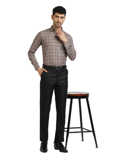 Model wearing Clarke Gable's Black Sharp Fit Trousers in a casual setting