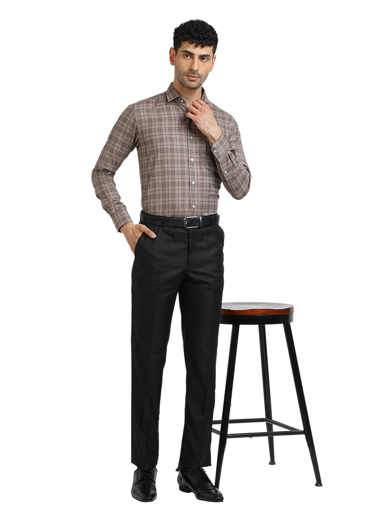 Model wearing Clarke Gable's Black Sharp Fit Trousers in a casual setting