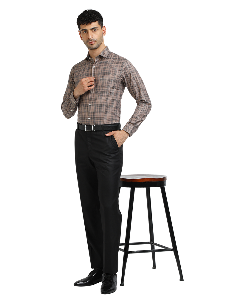 Model wearing Clarke Gable's Black Sharp Fit Trousers in a casual setting