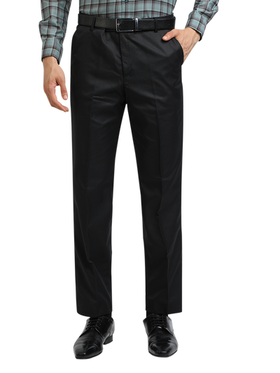 Model wearing Clarke Gable's Black Smart Fit Trousers in a casual setting