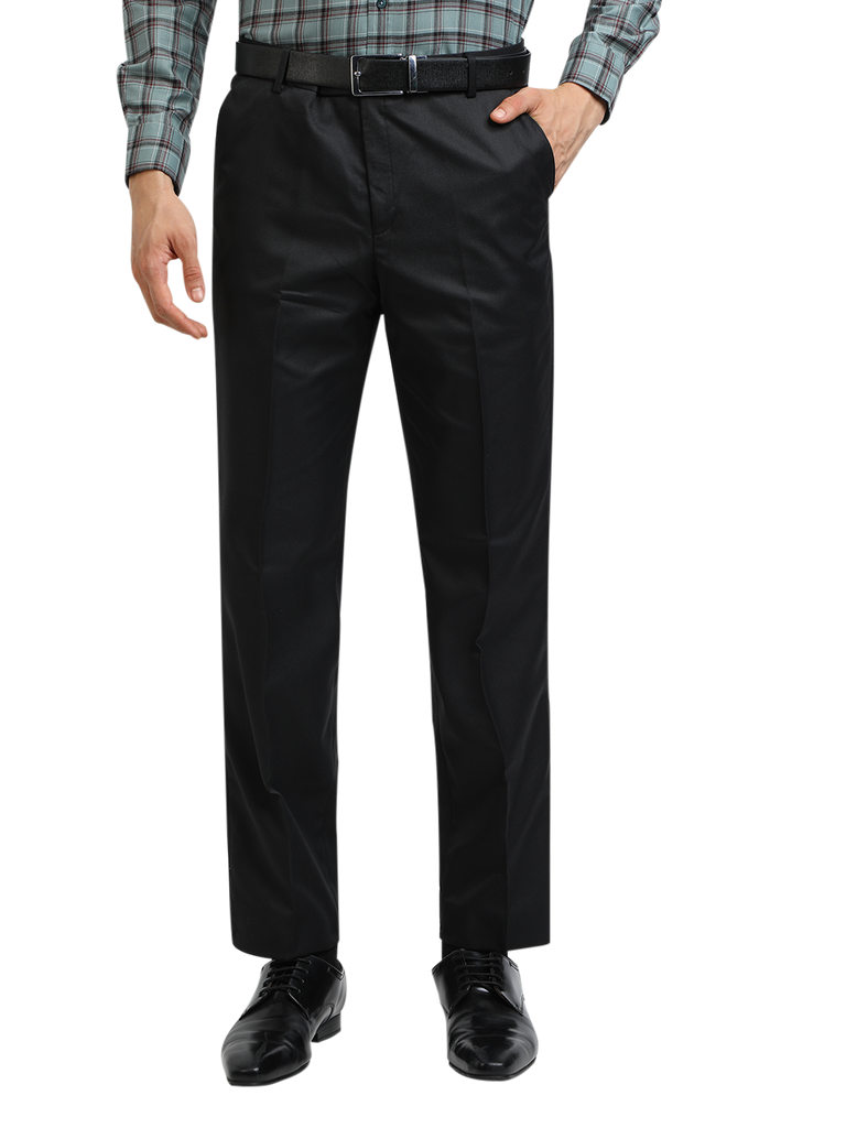 Model wearing Clarke Gable's Black Smart Fit Trousers in a casual setting