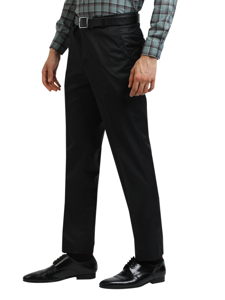 Model wearing Clarke Gable's Black Smart Fit Trousers in a casual setting