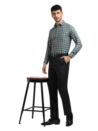 Model wearing Clarke Gable's Black Smart Fit Trousers in a casual setting