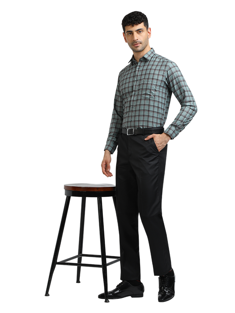 Model wearing Clarke Gable's Black Smart Fit Trousers in a casual setting