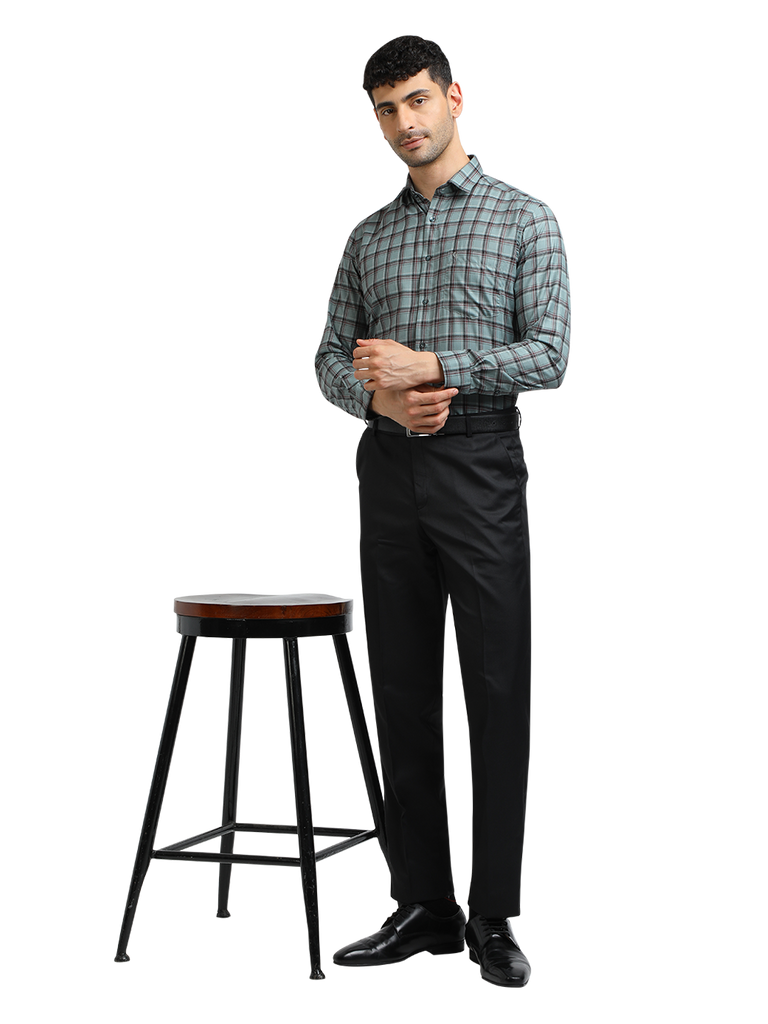 Model wearing Clarke Gable's Black Smart Fit Trousers in a casual setting