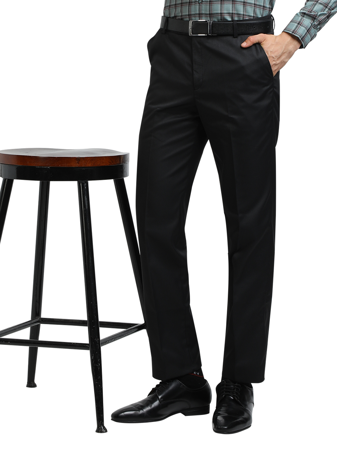 Model wearing Clarke Gable's Black Smart Fit Trousers in a casual setting