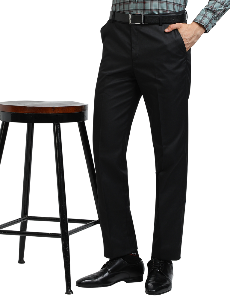 Model wearing Clarke Gable's Black Smart Fit Trousers in a casual setting