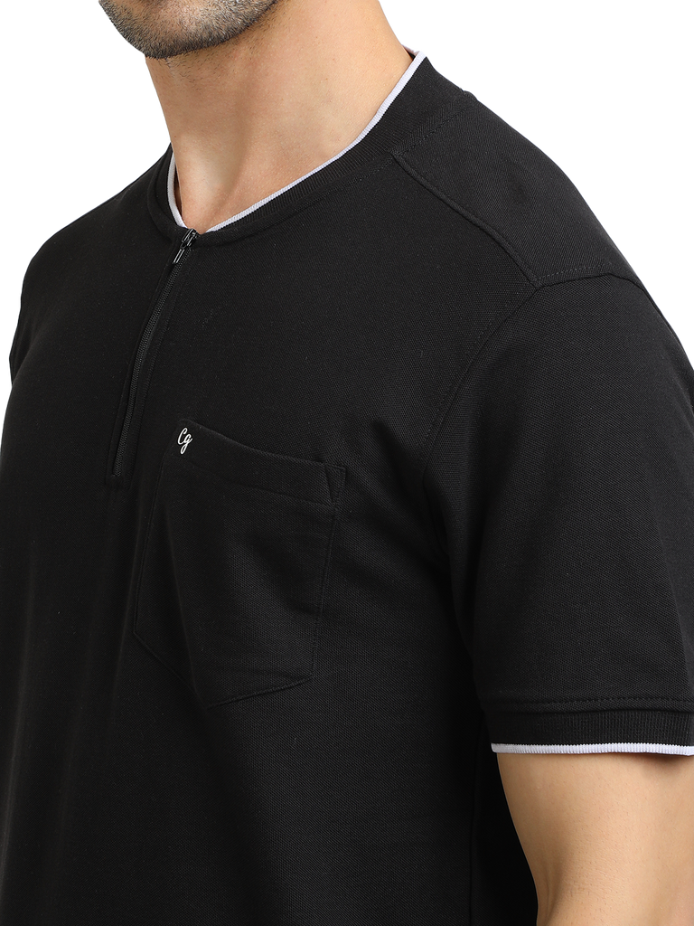 Model wearing Clarke Gable's Black Solid Henley Neck T-Shirt in a casual setting