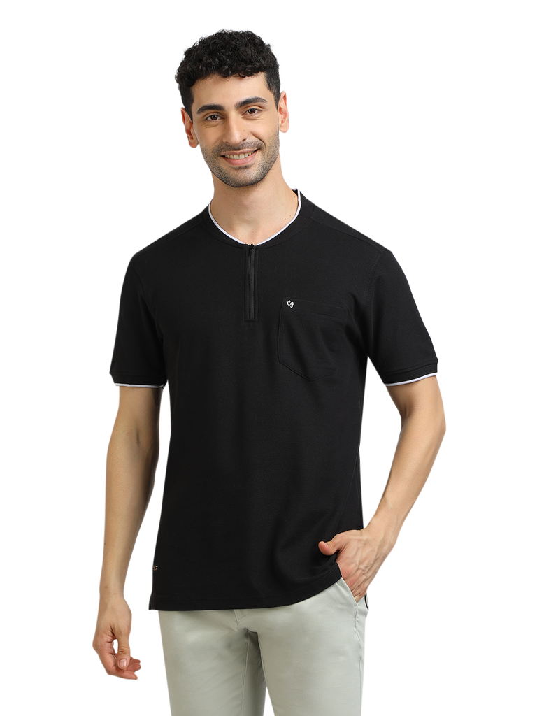 Model wearing Clarke Gable's Black Solid Henley Neck T-Shirt in a casual setting