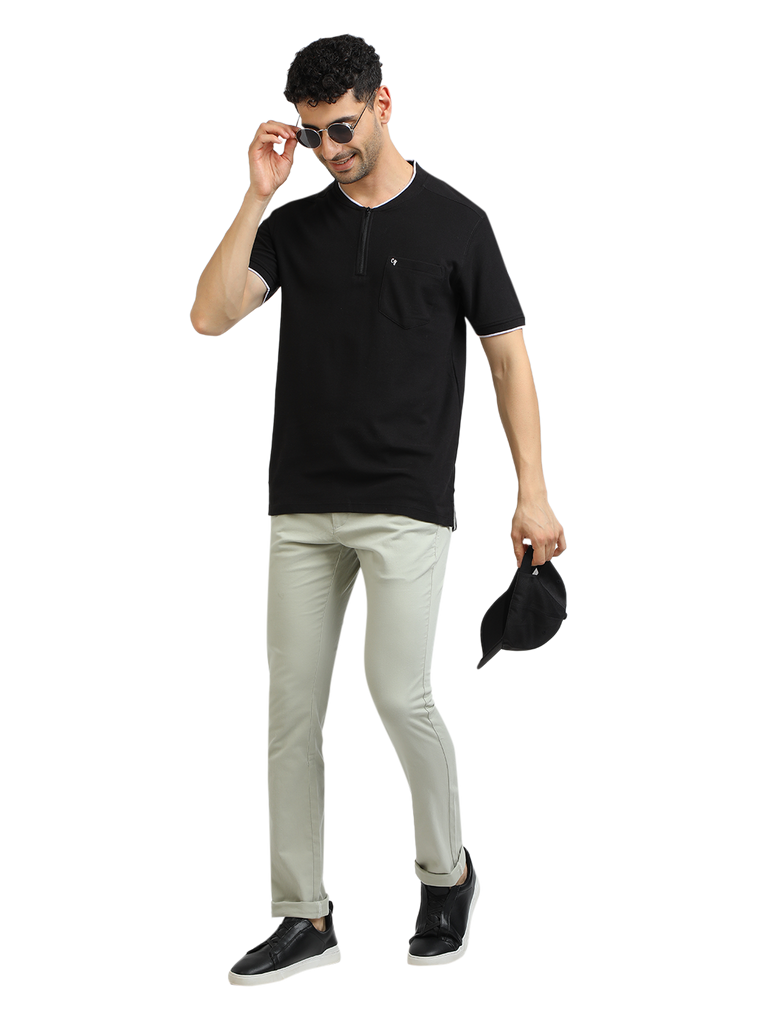 Model wearing Clarke Gable's Black Solid Henley Neck T-Shirt in a casual setting