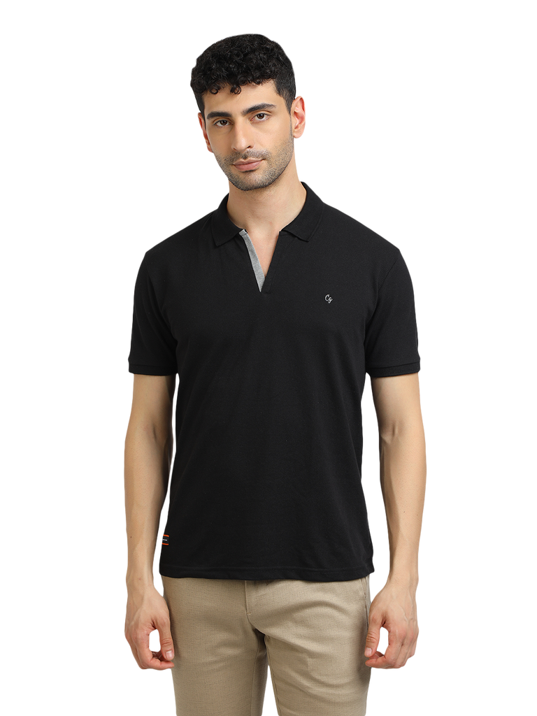 Model wearing Clarke Gable's Black Solid Polo Collar T-Shirt in a casual setting