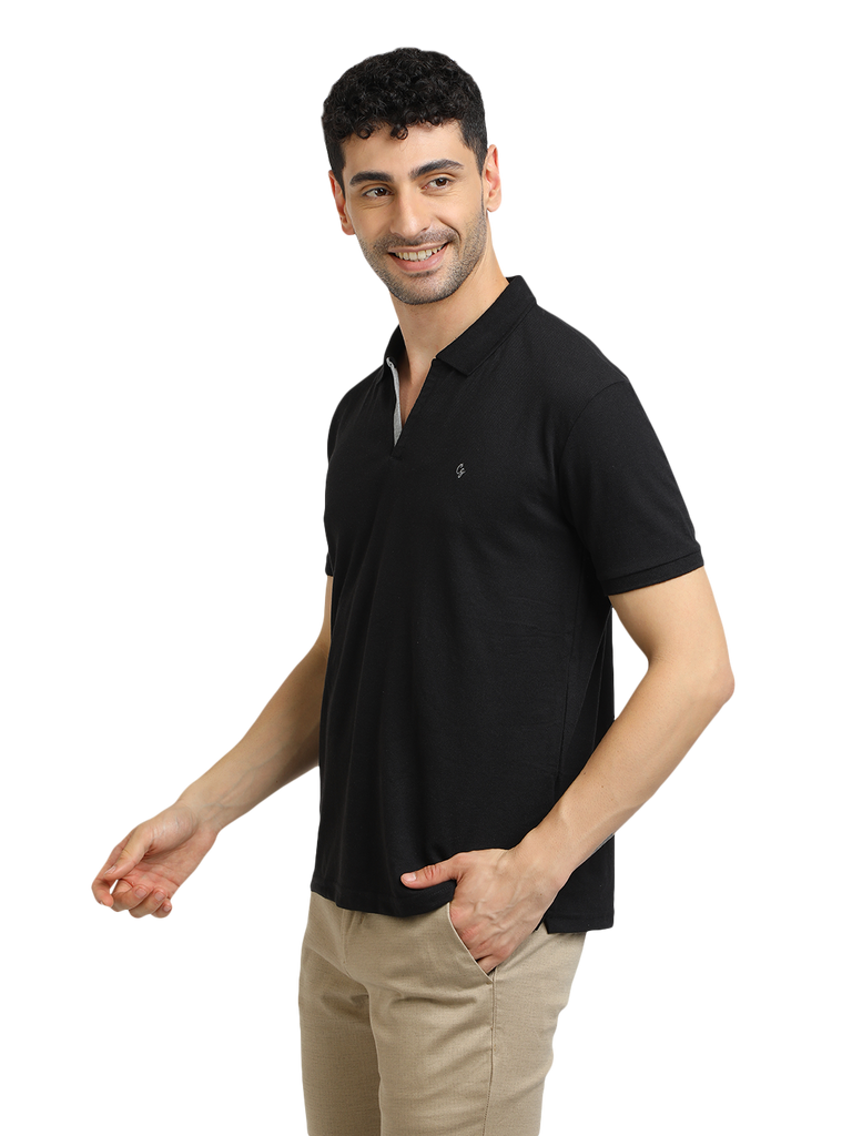 Model wearing Clarke Gable's Black Solid Polo Collar T-Shirt in a casual setting