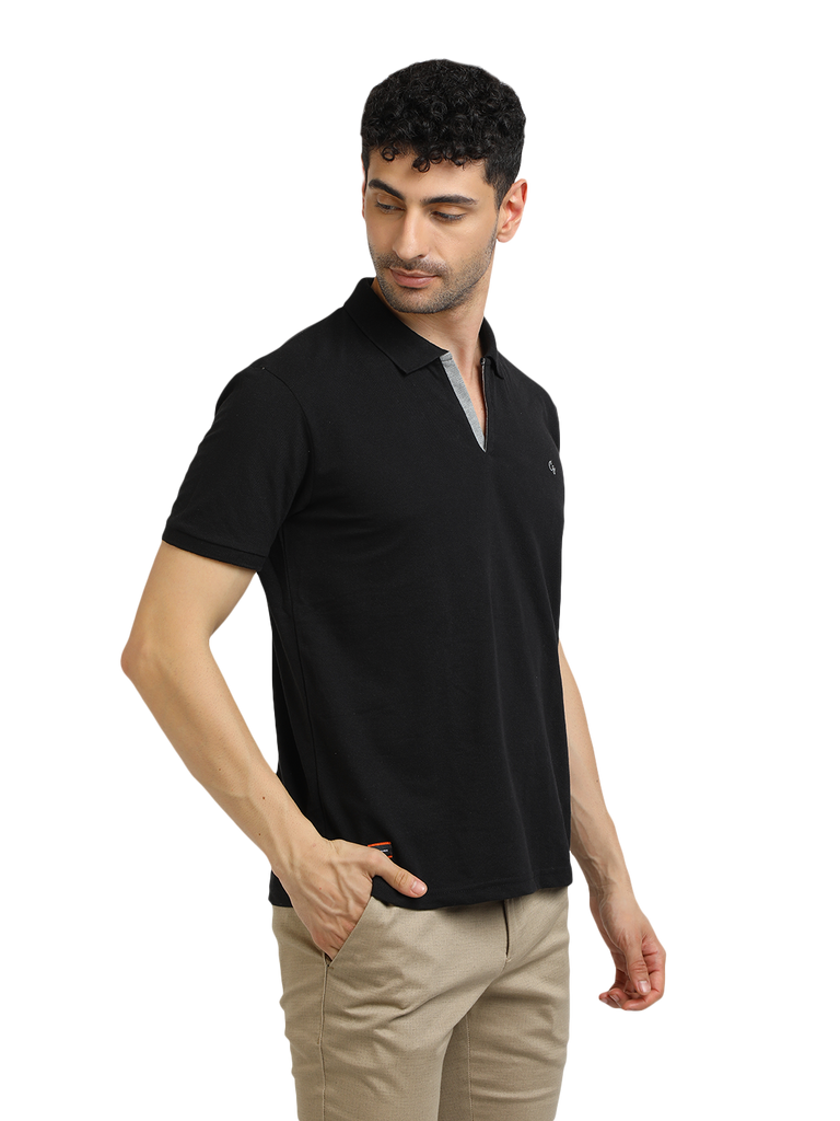 Model wearing Clarke Gable's Black Solid Polo Collar T-Shirt in a casual setting