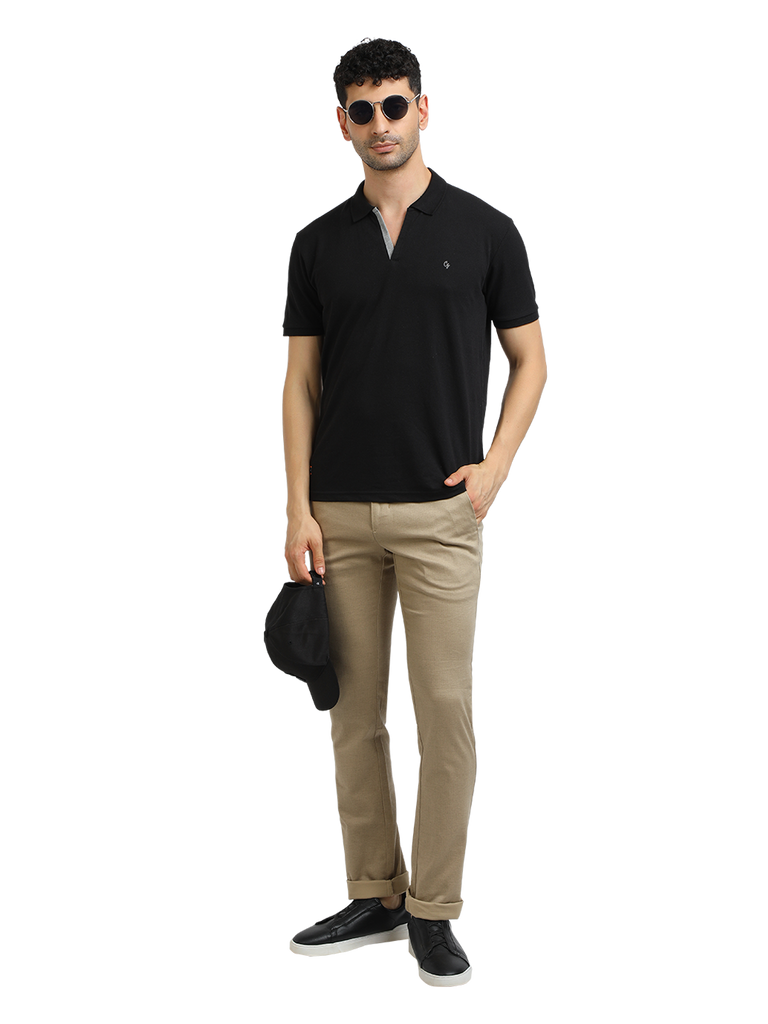 Model wearing Clarke Gable's Black Solid Polo Collar T-Shirt in a casual setting