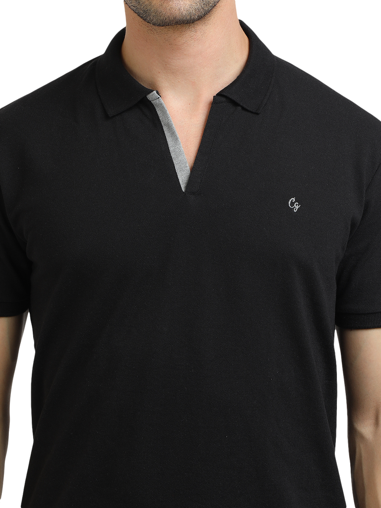 Model wearing Clarke Gable's Black Solid Polo Collar T-Shirt in a casual setting