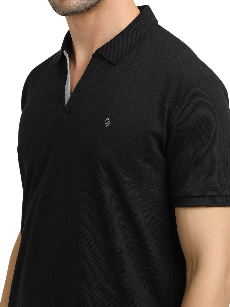 Model wearing Clarke Gable's Black Solid Polo Collar T-Shirt in a casual setting