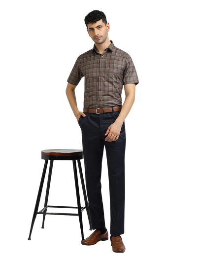 Model wearing Clarke Gable's Black With Brown Checked Formal Shirt in a casual setting