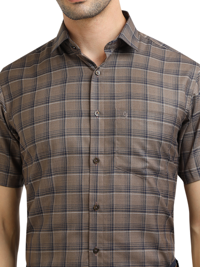 Model wearing Clarke Gable's Black With Brown Checked Formal Shirt in a casual setting