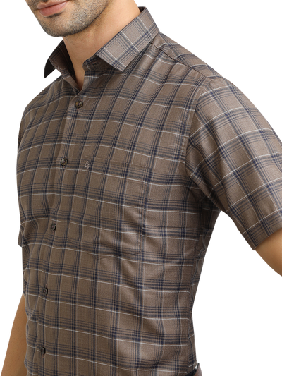 Model wearing Clarke Gable's Black With Brown Checked Formal Shirt in a casual setting