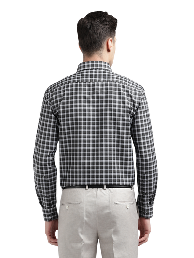 Model wearing Clarke Gable's Black With Light Grey Checked Formal Shirt in a casual setting
