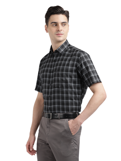 Model wearing Clarke Gable's Black With White Checked Formal Shirt in a casual setting