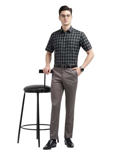 Model wearing Clarke Gable's Black With White Checked Formal Shirt in a casual setting