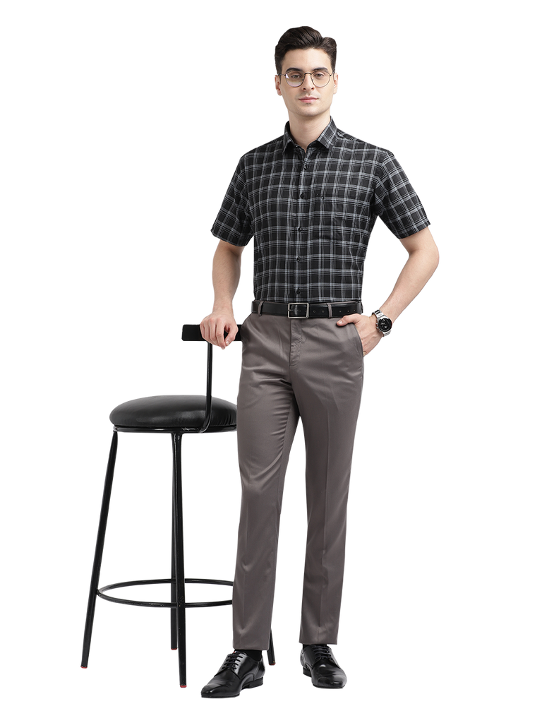 Model wearing Clarke Gable's Black With White Checked Formal Shirt in a casual setting