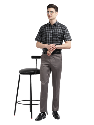 Model wearing Clarke Gable's Black With White Checked Formal Shirt in a casual setting