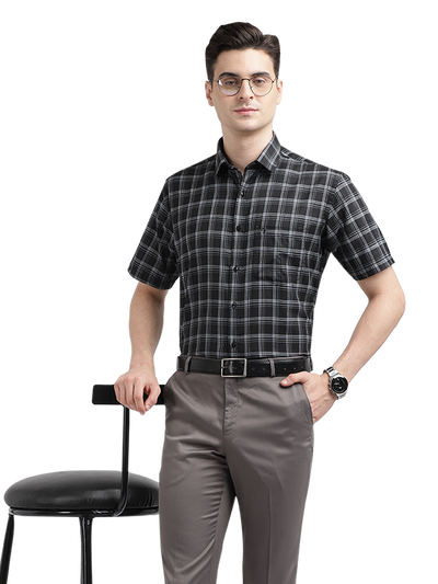 Model wearing Clarke Gable's Black With White Checked Formal Shirt in a casual setting