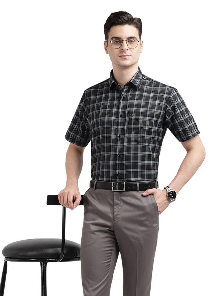 Model wearing Clarke Gable's Black With White Checked Formal Shirt in a casual setting