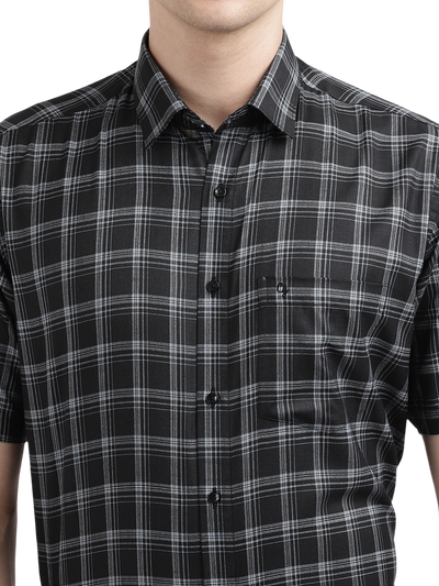Model wearing Clarke Gable's Black With White Checked Formal Shirt in a casual setting