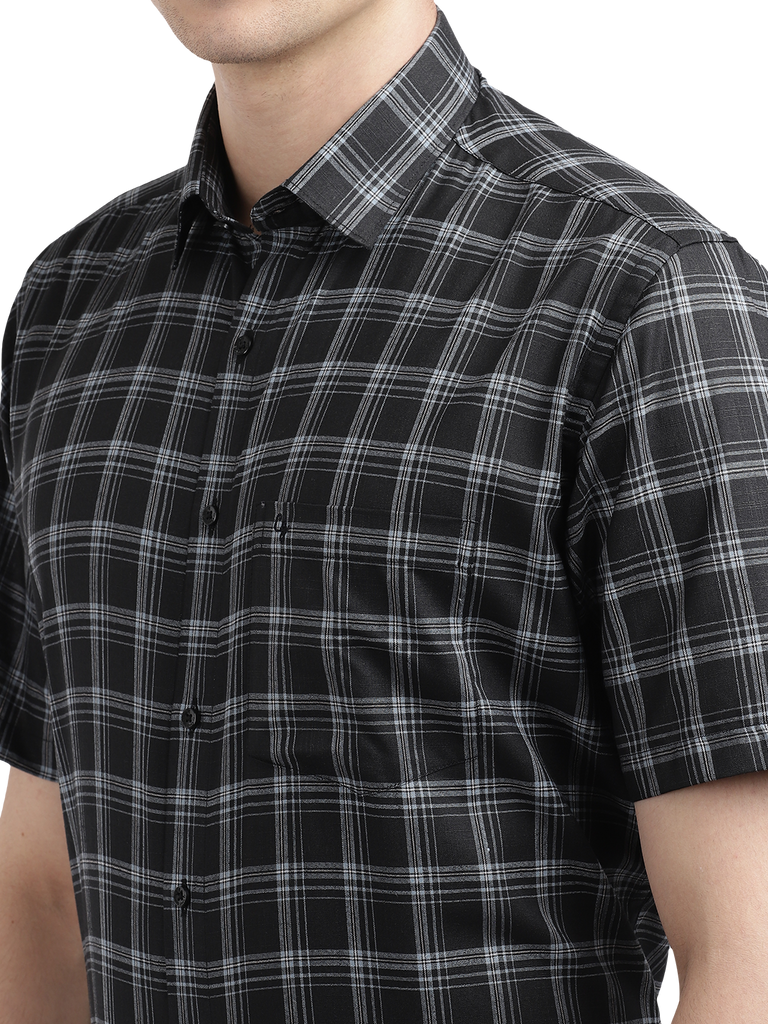 Model wearing Clarke Gable's Black With White Checked Formal Shirt in a casual setting