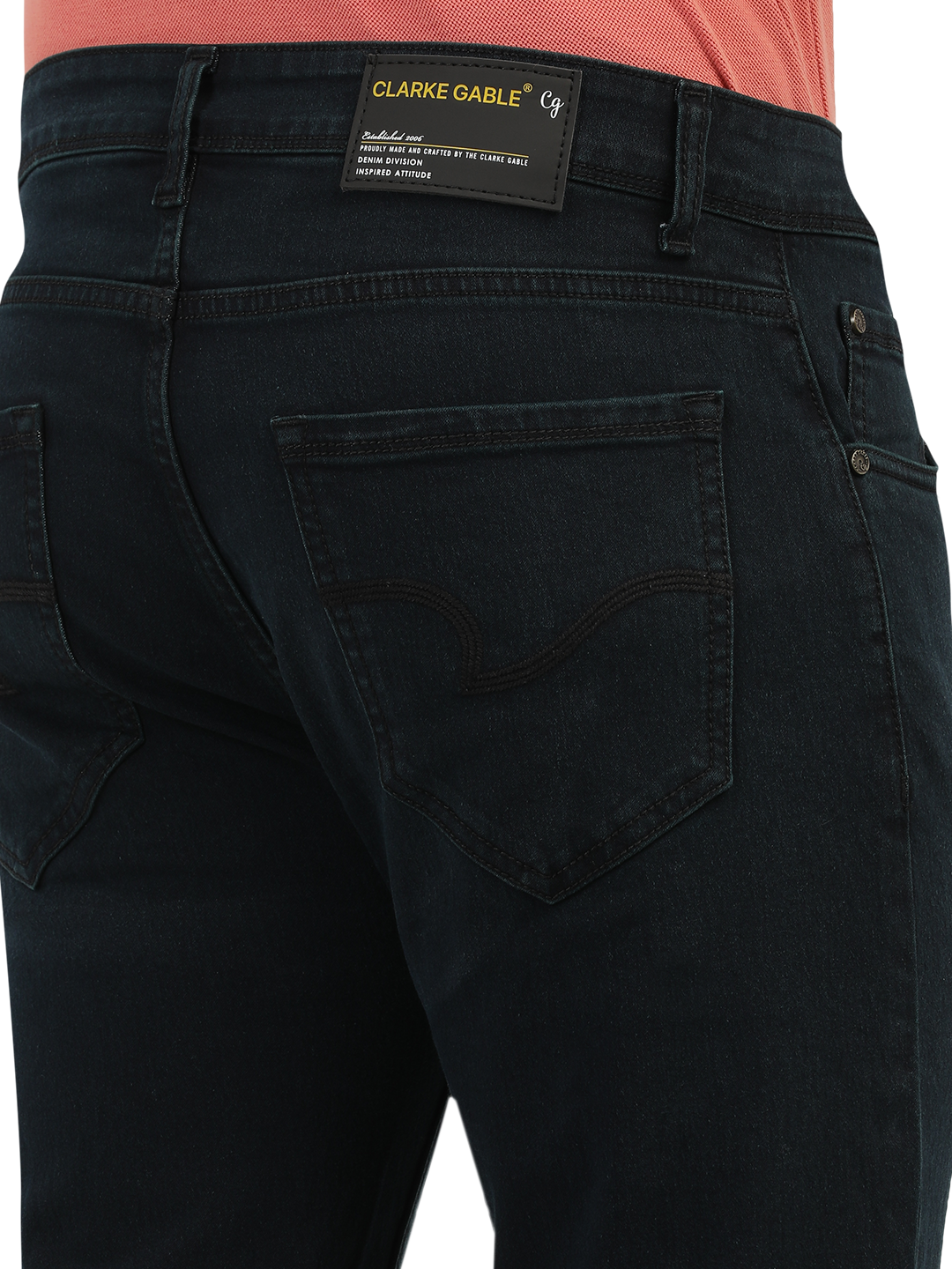 Model wearing Clarke Gable's Green Tinted Black Slim Fit Jeans in a casual setting