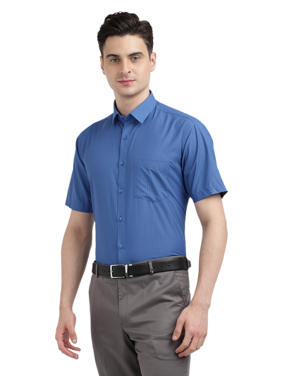 Model wearing Clarke Gable's Blue Checked Formal Shirt in a casual setting