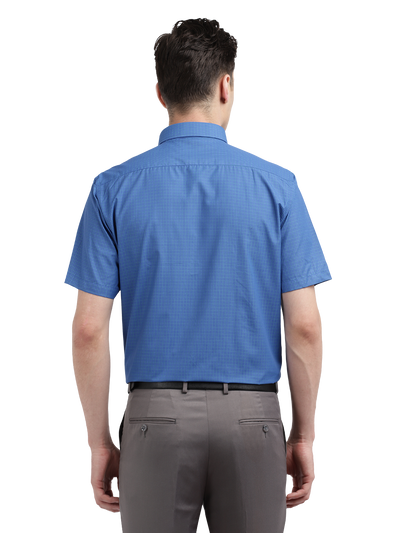 Model wearing Clarke Gable's Blue Checked Formal Shirt in a casual setting