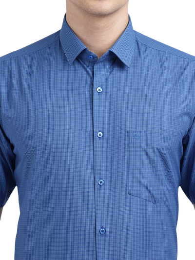 Model wearing Clarke Gable's Blue Checked Formal Shirt in a casual setting