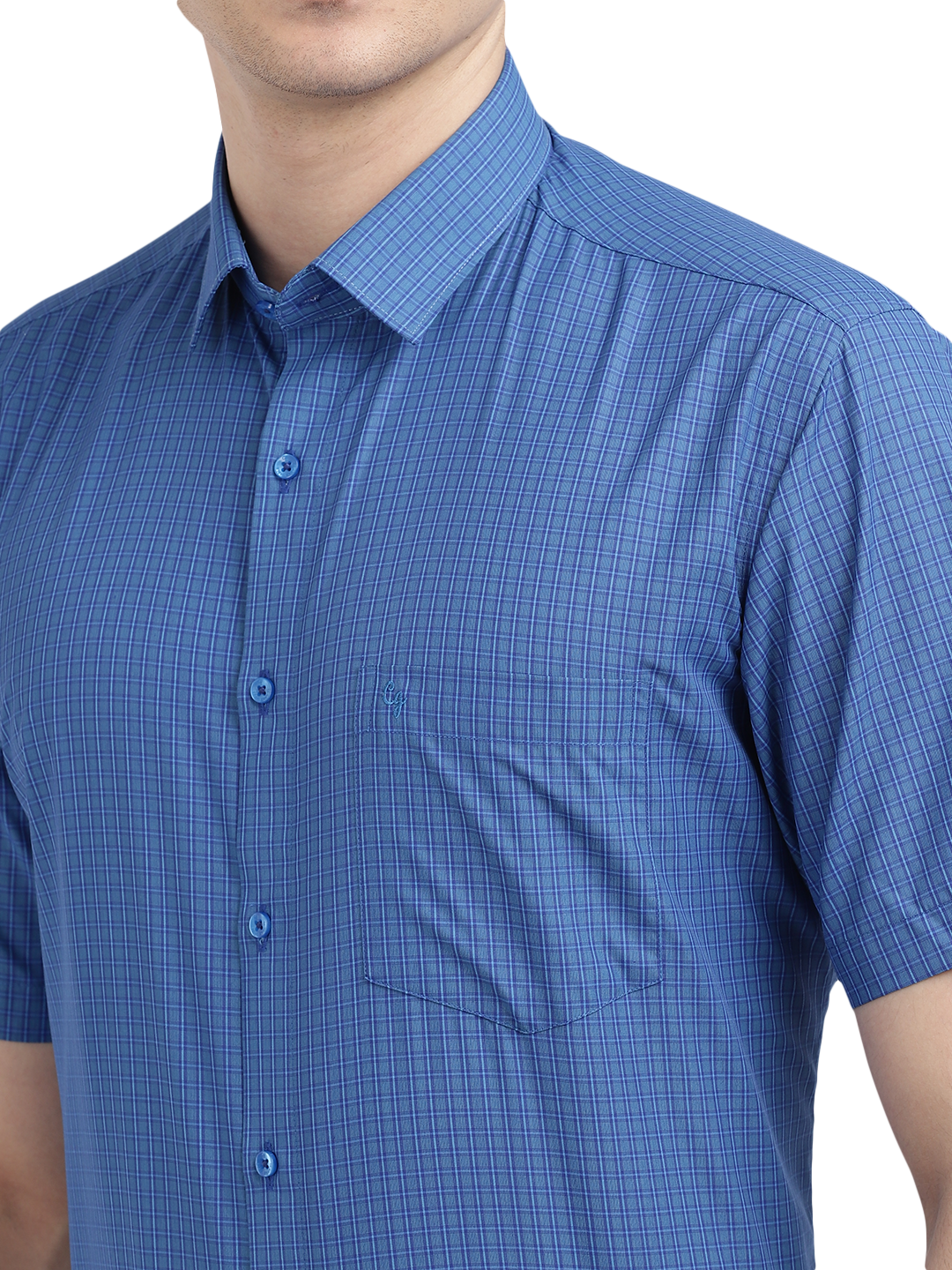 Model wearing Clarke Gable's Blue Checked Formal Shirt in a casual setting