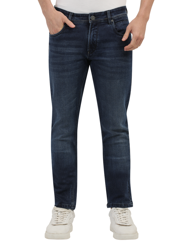 Model wearing Clarke Gable's Blue Skinny Fit Jeans in a casual setting