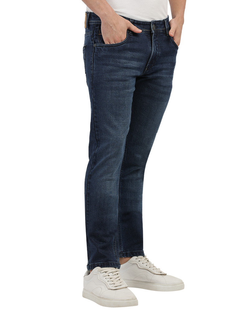 Model wearing Clarke Gable's Blue Skinny Fit Jeans in a casual setting