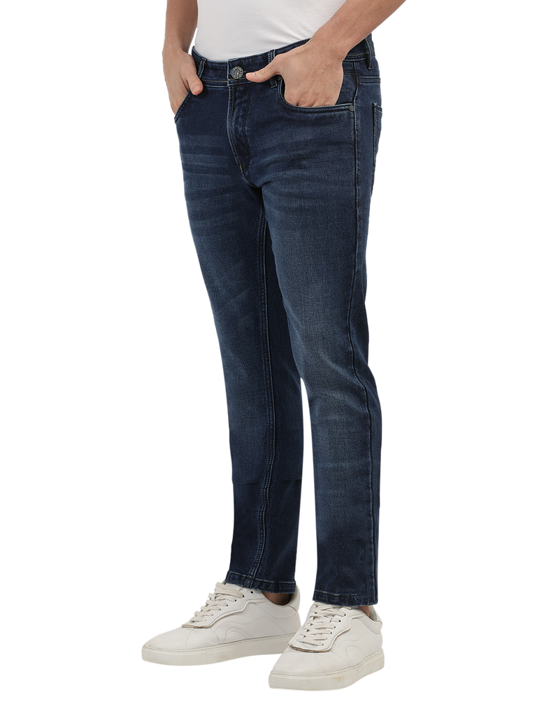 Model wearing Clarke Gable's Blue Skinny Fit Jeans in a casual setting