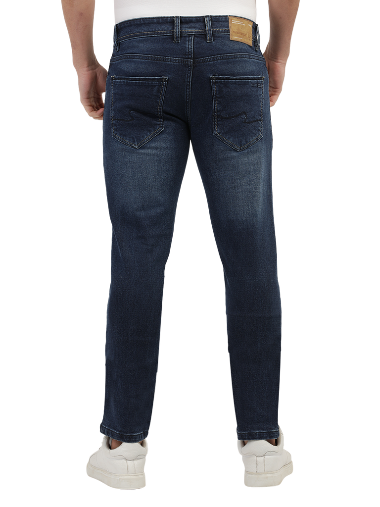 Model wearing Clarke Gable's Blue Skinny Fit Jeans in a casual setting