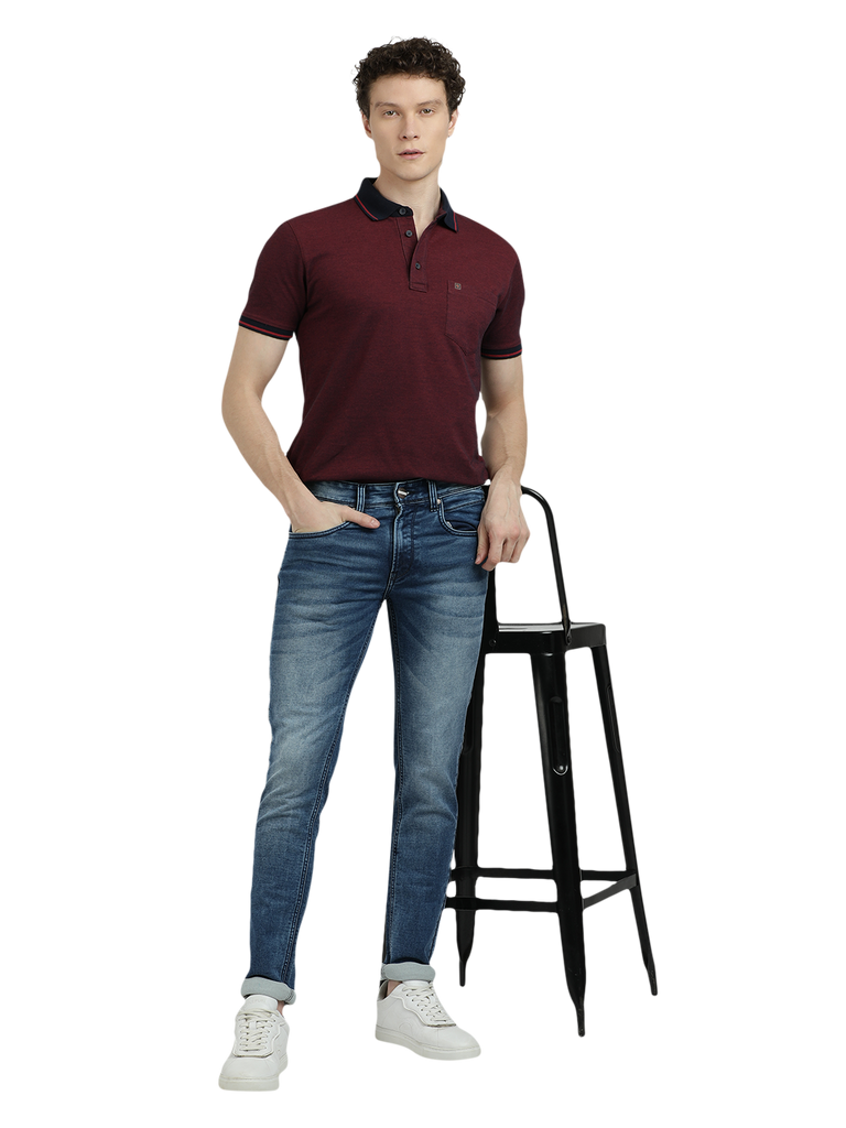 Model wearing Clarke Gable's Blue Whiskers Fade Skinny Fit Jeans in a casual setting